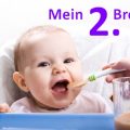 Baby wird mit Brei gefüttert